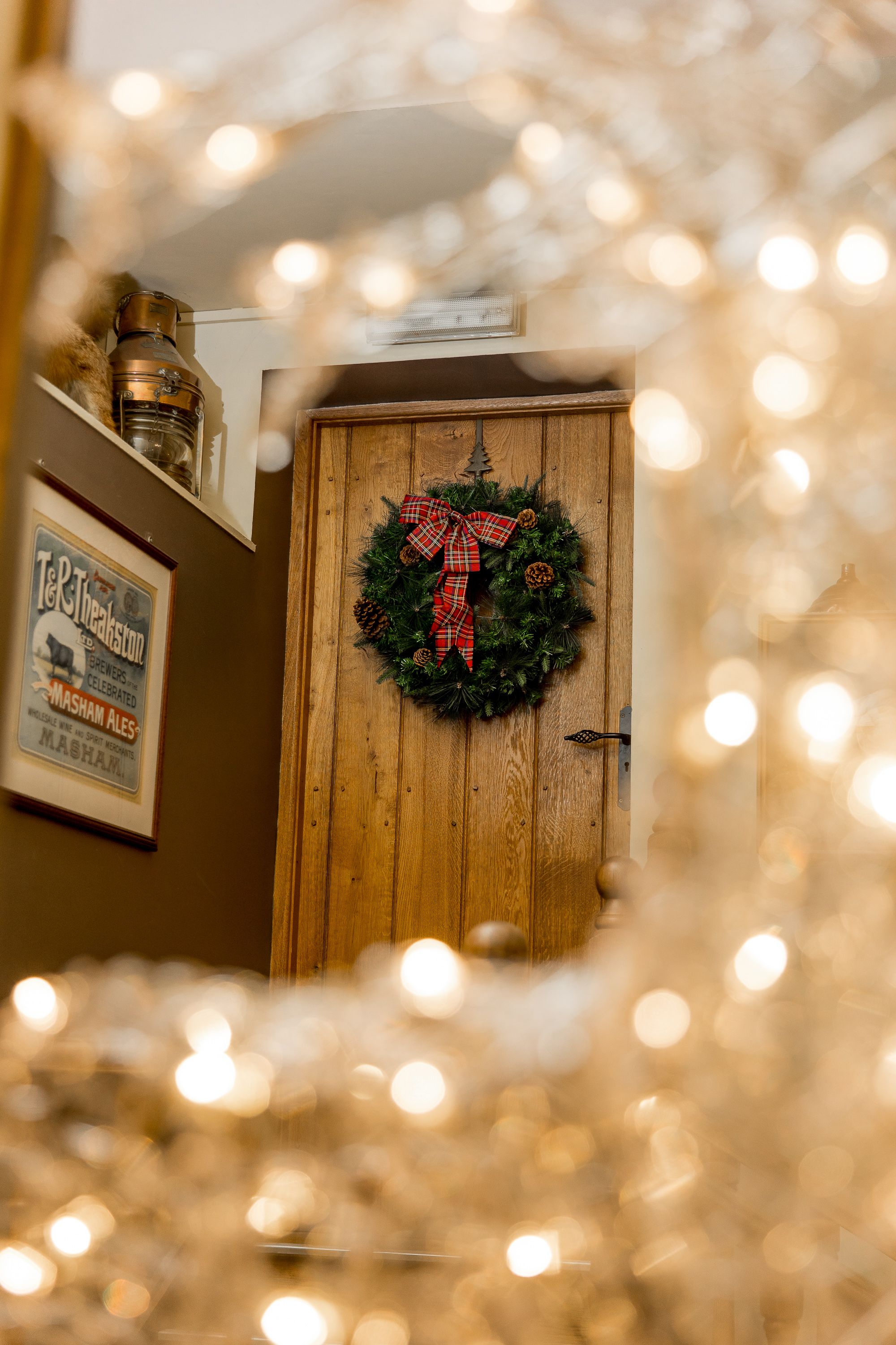 christmas wreath hung on a door