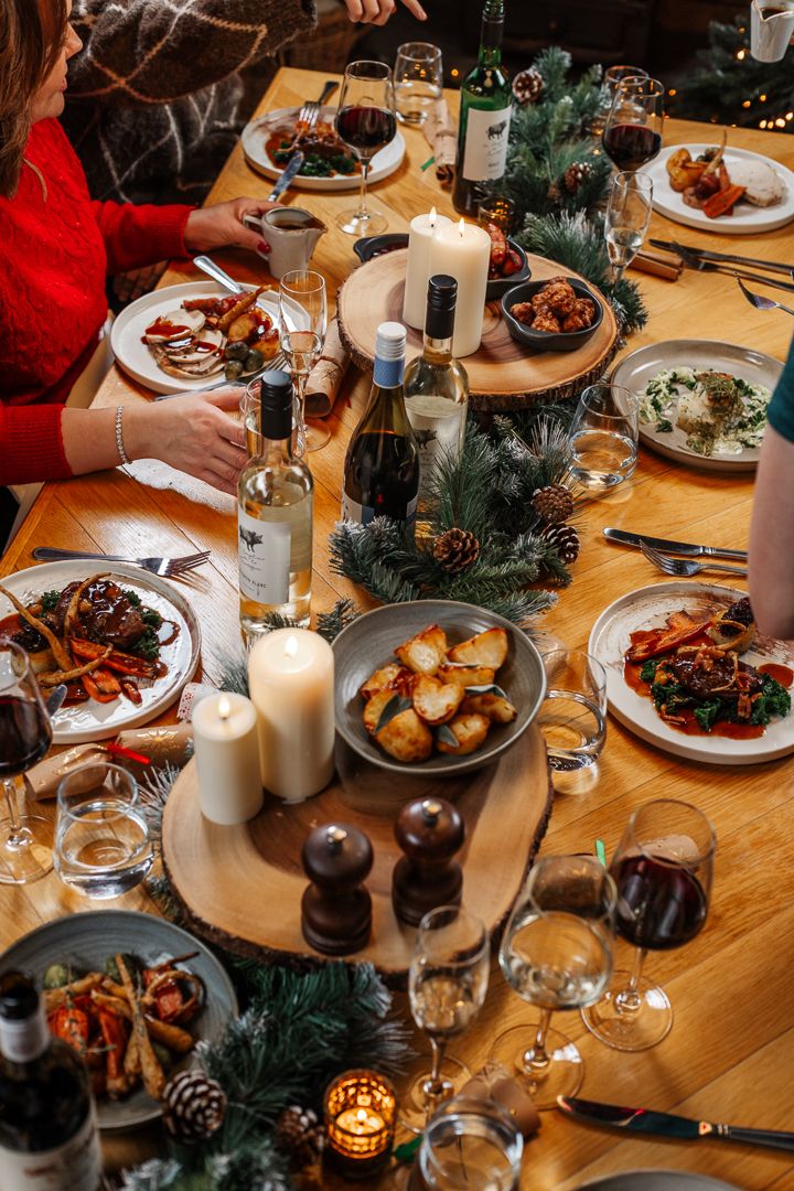 table filled with festive dining dishes