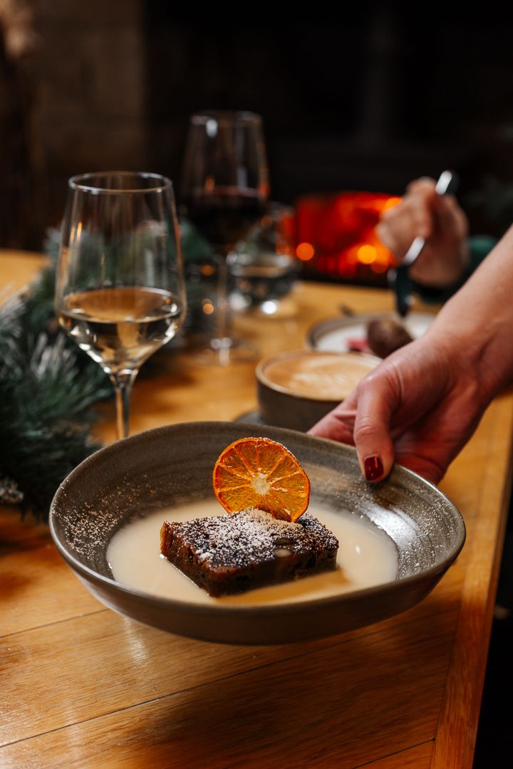 Christmas pudding with brandy cream sauce